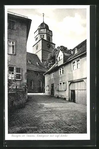 AK Usingen i. T., Kirchgasse mit evgl. Kirche