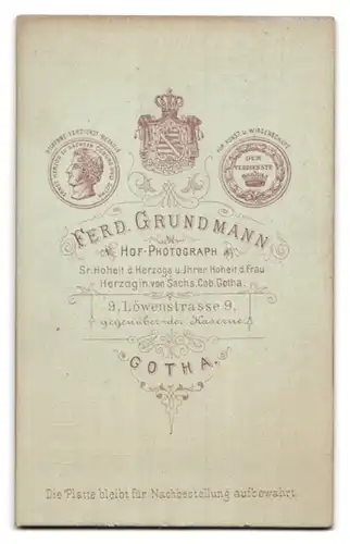 Fotografie Ferd. Grundmann, Gotha, Löwenstrasse 9, Portrait niedlicher Bube mit dunklem Haar im Jackett