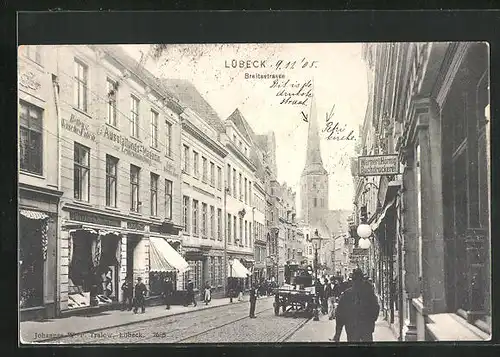 AK Lübeck, Breitestrasse mit Geschäften und Kirche