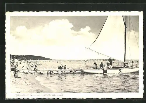 AK Timmendorferstrand, Szene mit Segelschiff am Ostseeufer