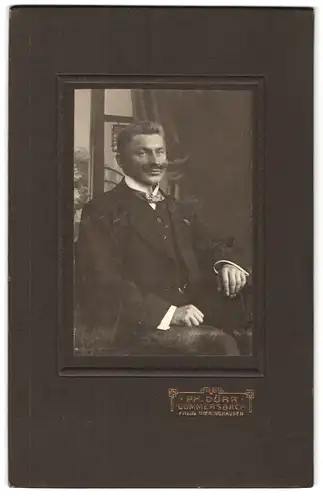 Fotografie Ph. Dürr, Gummersbach, Portrait stattlicher Herr mit Schnurrbart im Jackett