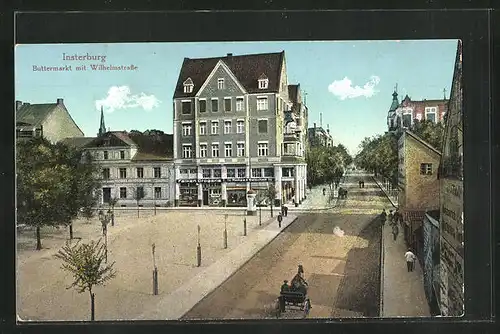 AK Insterburg, Buttermarkt mit Wilhelmstrasse & Geschäften