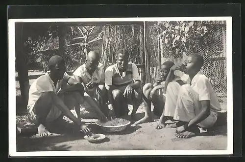 AK Afrikaner bei der Mahlzeit