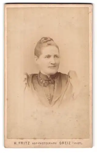 Fotografie Heinr. Fritz, Greiz, Weststrasse 6, Portrait bürgerliche Dame mit hochgestecktem Haar