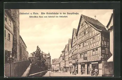 AK Ochsenfurt a. Main, Historisches Haus vom Schmied von Ochsenfurt und Fotografiegeschäft in der Hauptstrasse