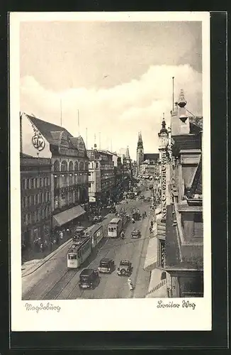 AK Magdeburg, Breiter Weg mit Strassenbahnen und Passanten