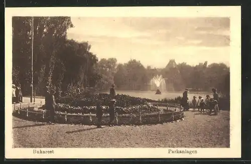 AK Bukarest, Kinder in den Parkanlagen am Teich mit Springbrunnen
