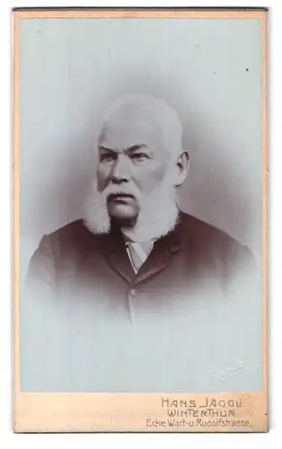 Fotografie Hans Jäggli, Winterthur, Wart - Ecke Rudolfstr., Portrait Herr mit weissem Backenbart