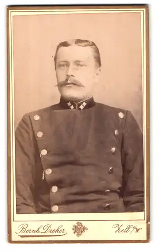 Fotografie Bernh. Dreher, Zell i. W., Portrait Eisenbahner in Uniform mit Moustache