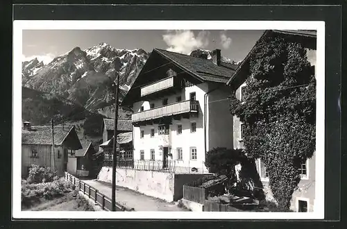 AK Tobadill, Alpengasthaus Rittlerblick im Sonnenschein