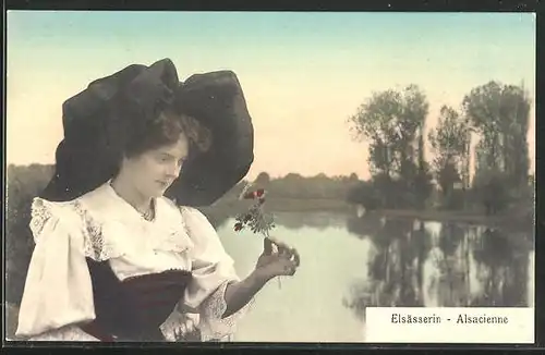 AK Elsässerin in elsass-lothringischer Tracht mit Blume