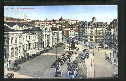 AK Zürich, Bahnhofplatz mit Geschäften und Strassenbahn