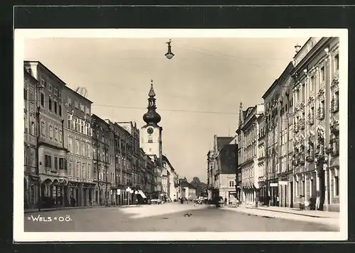 AK Wels, Strassenansicht mit Geschäften