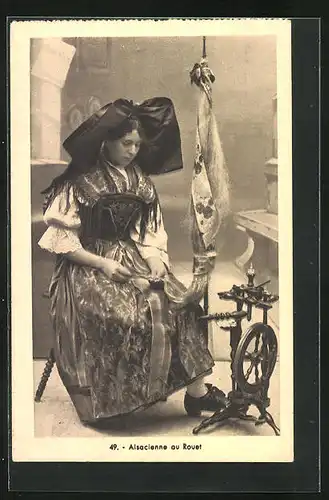 AK Elsässerin in elsass-lothringischer Tracht am Spinnrad