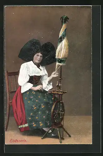 AK Elsässerin in elsass-lothringischer Tracht am Spinnrad