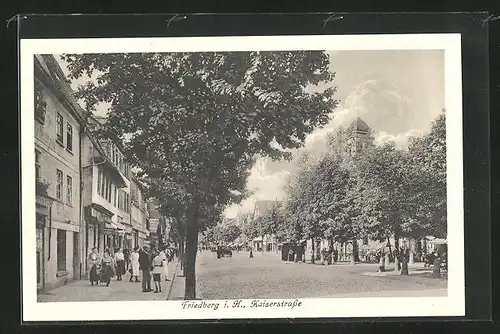 AK Friedberg i. H., Kaiserstrasse mit Geschäften