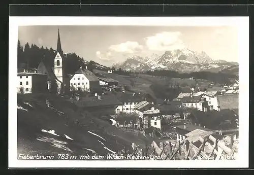 AK Fieberbrunn, Ortsansicht mit dem Wilden Kaiser