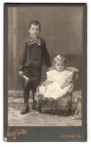 Fotografie Eug. Held, Horgen, Portrait zwei bildschöne Kinder in Anzug und Kleid
