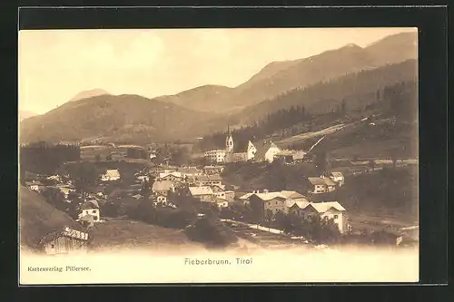 AK Fieberbrunn, Dorf gegen das Gebirge