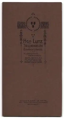 Fotografie Ch. Lutz, Tirschenreuth, Bahnhofstrasse, Mädchenmit Bibel & Kerze nach der Kommunion