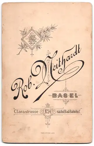 Fotografie R. Neithardt, Basel, Clarastr. 54, Portrait junger Mann mit Oberlippenbart im Mantel