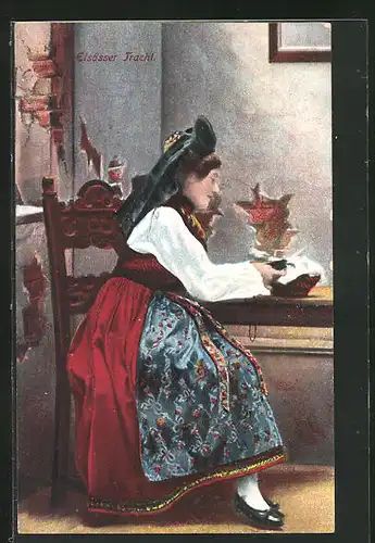 AK Alsace, Frau in elsass-lothringische Tracht sitzt am Tisch