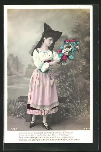 AK Elsass - Lothringen, Frau in Tracht mit Blumenstrauss