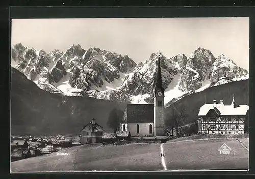 AK Gosau, Ortspartie mit Kirche im Gebirge