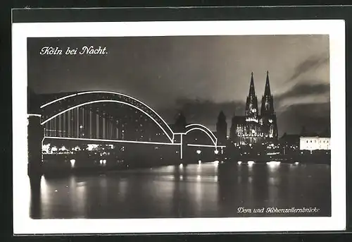 AK Köln, Dom und Hohenzollernbrücke bei Nacht