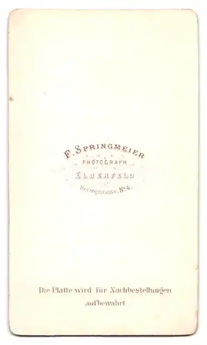 Fotografie F. Springmeier, Elberfeld, Herzogstr. 4, Portrait Herr mit Halbglatze trägt Cord-Jacket