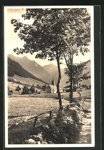 AK Oberjoch, Kirche gegen Gebirge