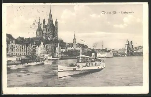 AK Köln a. Rhein, Rheinpartie, Blick auf die Rheinbrücke und den Dom
