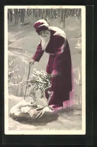 AK Weihnachtsmann in idyllischer Schneelandschaft