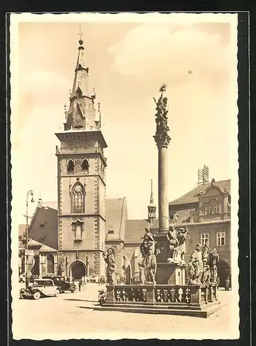 AK Komotau / Chomutov, Stadtkirche und Dreifaltigkeitssäule