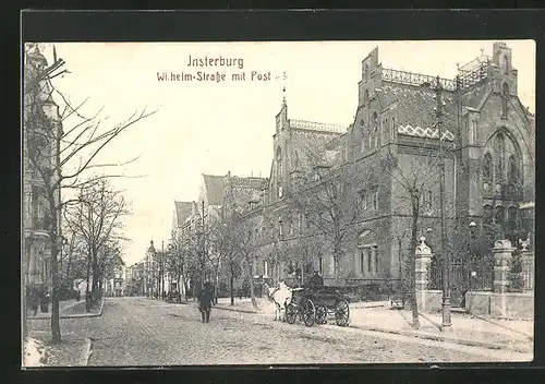 AK Insterburg, Wilhelm-Strasse mit Post und Pferdewagen