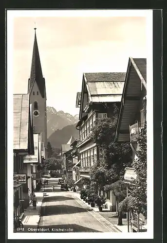 AK Oberstdorf, Kirchstrasse mit Gebäudezeile