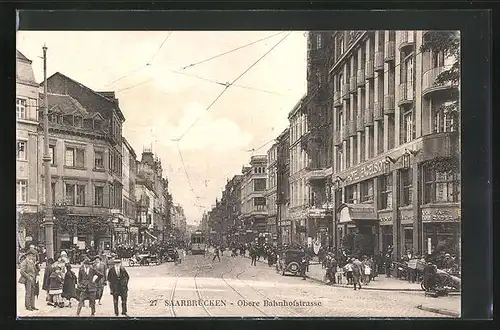 AK Saarbrücken, Obere Bahnhofstrasse mit Geschäften und Strassenbahn