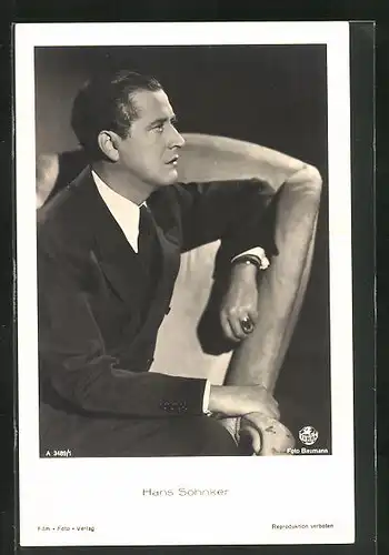 AK Schauspieler Hans Söhnker im Profil auf einem Sessel