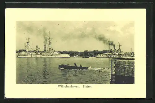 AK Wilhelmshaven, Hafen mit Kriegsschiffen und Boot