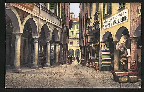 AK Lugano, Via Pessina, Strassenpartie mit Tuchhandlung