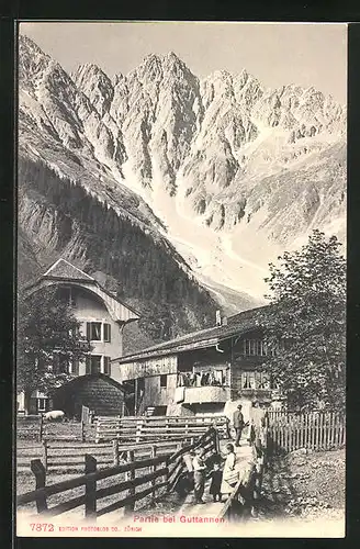 AK Guttannen, Ortspartie mit Blick auf die Alpen