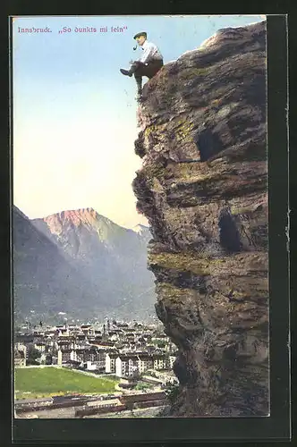 AK Innsbruck, Mann auf einem Fels mit Blick zur Stadt - So dunkts mi fein