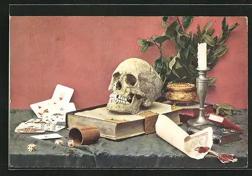 AK Totenkopf auf einem Buch mit Würfelbecher und Kartenspiel