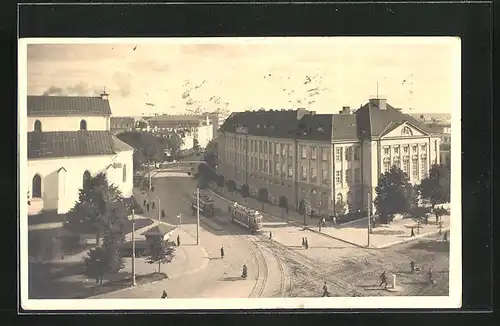 Foto-AK Tallinn, Strassenbahnen an der Kirche