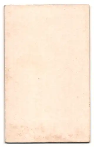 Fotografie Ph. Glade, Schmallenberg, Portrait Mädchen im dunklen Kleid mit Kommunionskerze und Bibel