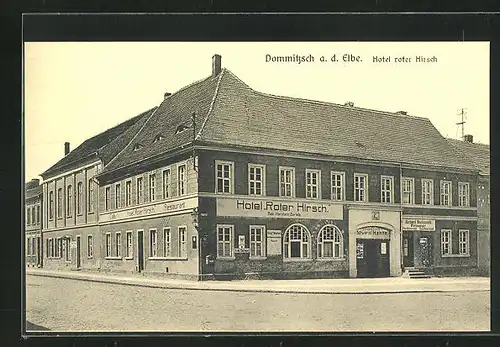 AK Dommitzsch / Elbe, Hotel Roter Hirsch mit Strassenpartie