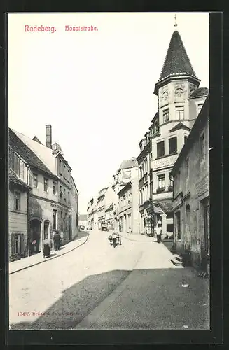 AK Radeberg, Hauptstrasse mit Restaurant und Geschäften