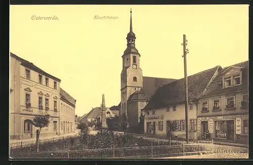 AK Elsterwerda, Hauptstrasse mit Geschäften, Apotheke und Kirche