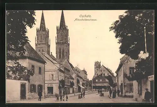 AK Oschatz, Altoschatzerstrasse mit Buchhandlung und Kirche