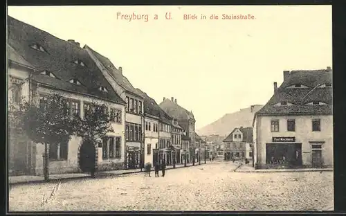 AK Freyburg a. U., Blick in die Steinstrasse mit Geschäften